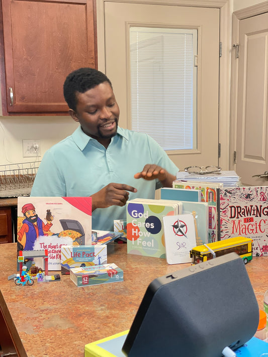 Image of founder speaking about books